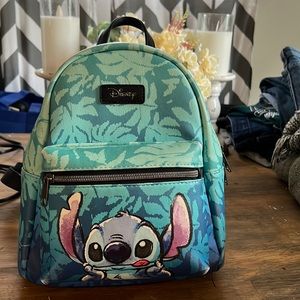 LoungeFly Stitch Backpack Purse. Includes Stitch wallet and stitch keychains.